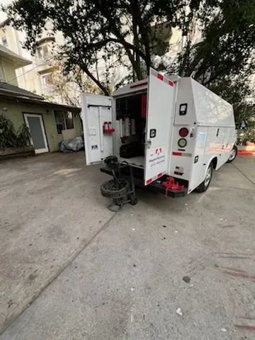 Magnet Plumbing service vehicle on-site for Grease Trap Cleaning in Southern Palms